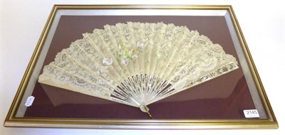 Lot 2145 - Late 19th Century Mother of Pearl Fan with pierced and painted sticks, with a lace mount hand...