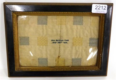 Lot 2212 - Early 19th Century Stitch Sampler worked by Ann Bartram Cook 1807, in yellow and blue threads,...