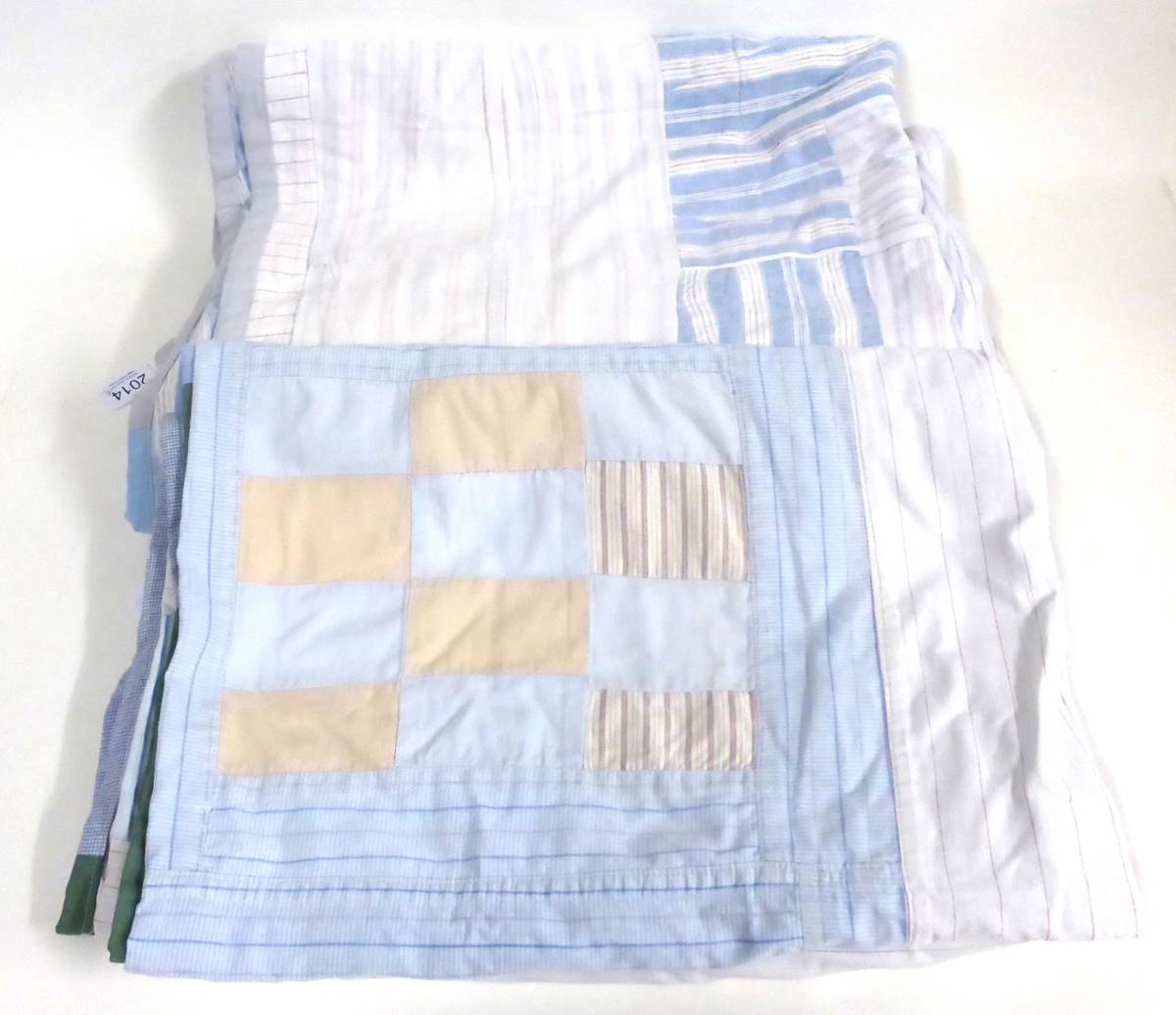 Lot 2014 - Early 20th Cotton Reversible Patchwork Bed Cover, incorporating cotton striped shirts, 175cm by...