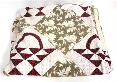 Lot 2023 - Late 19th Century Cotton Patchwork Quilt, in the basket design, within a floral border, 200cm...