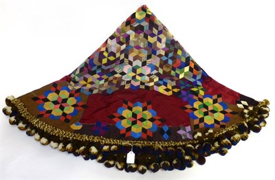 Lot 2025 - Late 19th Century Silk Patchwork Circular Table Cover, with bobble and wool trim, 150cm diameter