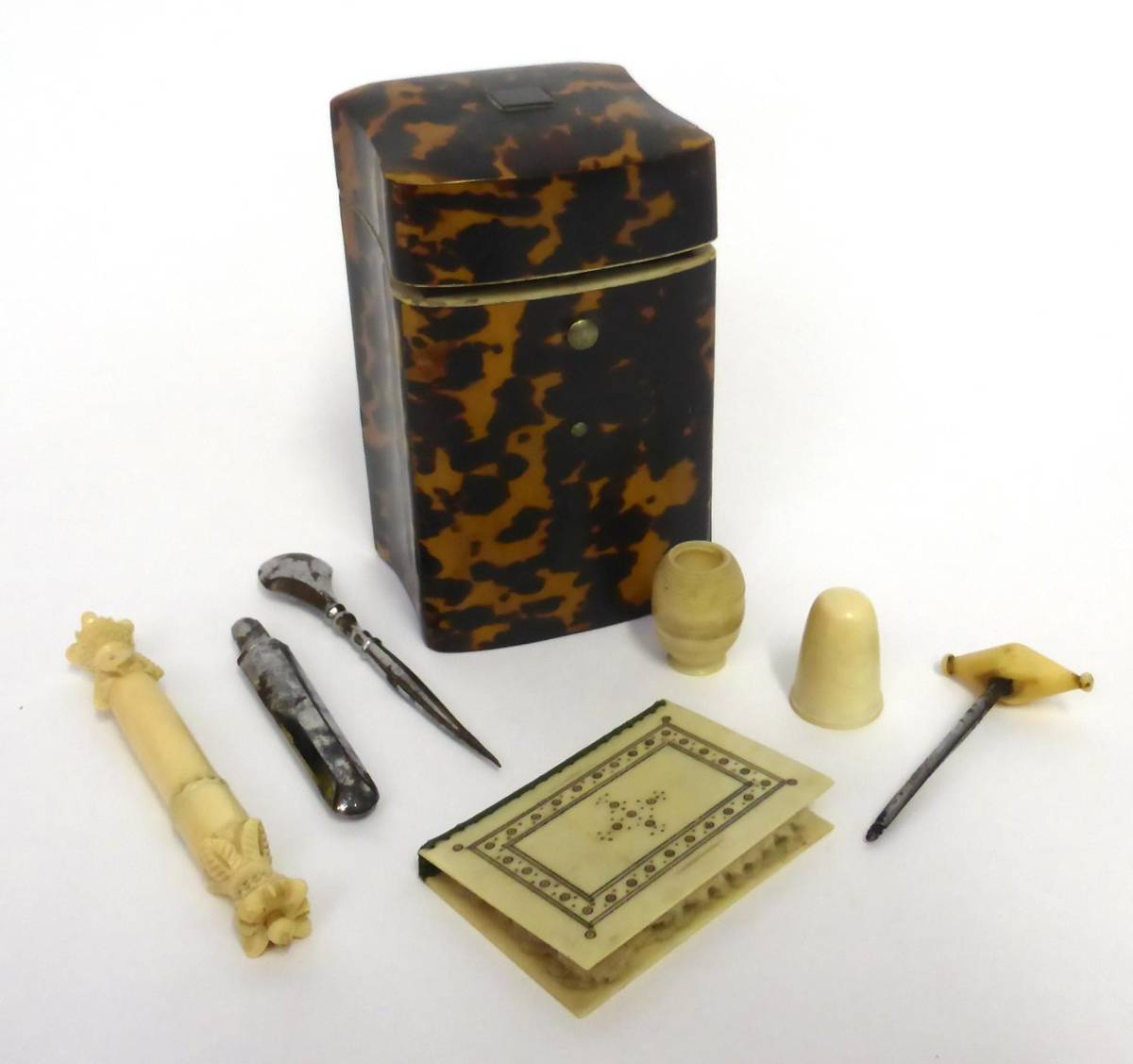 Lot 2034 - A 19th Century Tortoiseshell Ladies Companion, with hinged cover enclosing later fittings of...