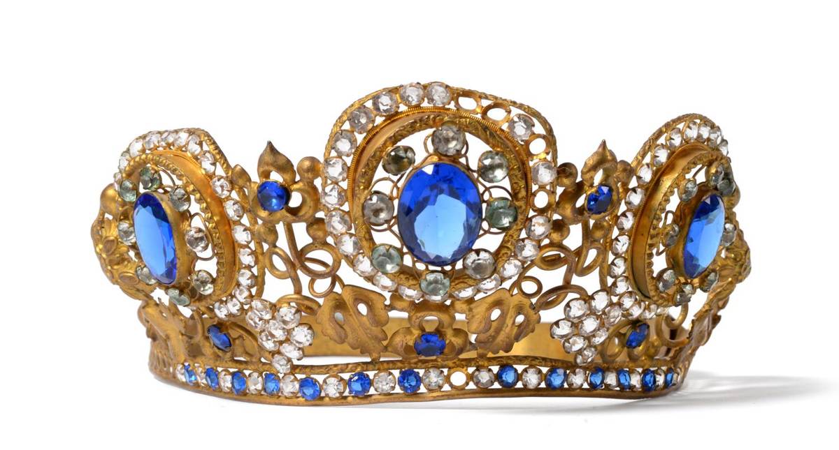 Lot 2040 - 20th Century Gilt Metal Tiara, set with blue and paste stones of foliate design, 52cm circumference