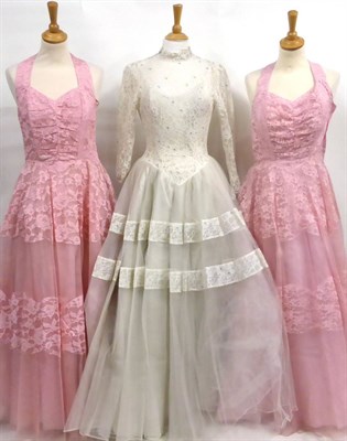 Lot 2117 - 1957 White Net and Lace Mounted Wedding Dress, with fitted long sleeved bodice, sequin and...
