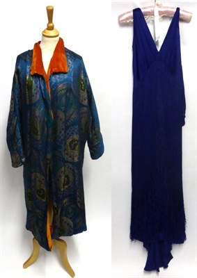Lot 2136 - A Circa 1930 Blue Silk Opera/Evening Coat woven in metallic threads with a peacock feather stylised
