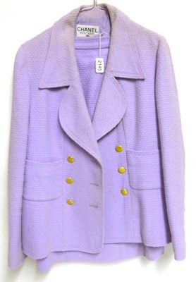 Lot 2145 - Chanel Boutique Two Piece Suit, in lavender textured cotton, comprising a double breasted...