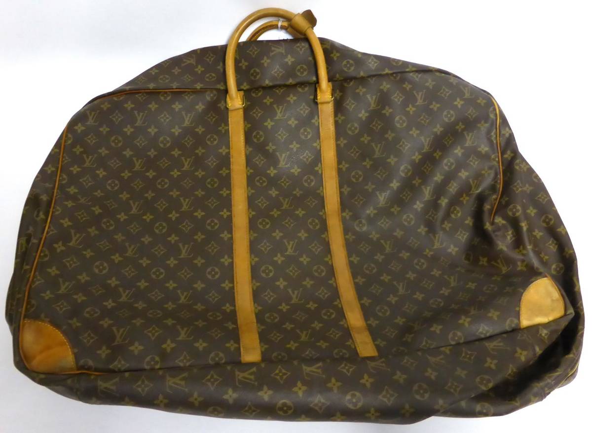 Lot 2190 - Louis Vuitton Sirius 70 Monogrammed Brown Canvas Case, with light tan mounts and trims, two...