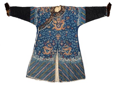 Lot 2199 - A Late 19th Century Chinese Qing Winter Dragon Robe, in blue silk embroidered overall with five...