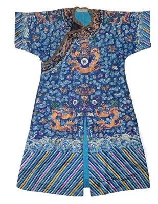 Lot 2200 - A Late 19th Century Chinese Qing Dragon Robe, in blue silk embroidered overall with five clawed...