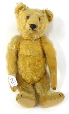 Lot 2010 - Early/Mid 20th Century Pale Yellow Mohair Steiff Teddy Bear, with jointed body, humped back,...