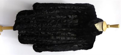Lot 2058 - Dark Mink Jacket, of patched design, labelled size 12