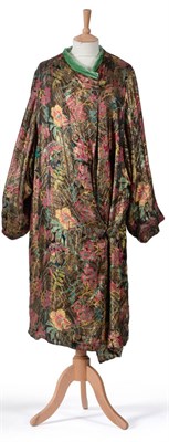 Lot 2108 - Circa 1920s Debenham and Freebody London Lame Evening Coat, with green velvet lining, long...