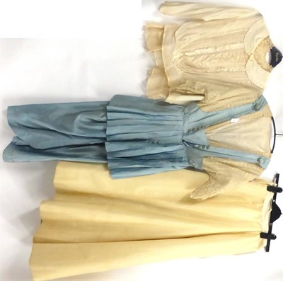 Lot 2116 - Edwardian Cream and Pale Blue Silk Dress, with a faux buttoned pinafore style mount in pale...