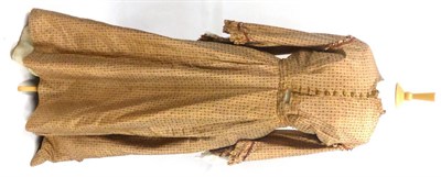 Lot 2127 - Late 19th Century Brown Printed Silk Dress, with elbow length flared lower sleeves, attached...