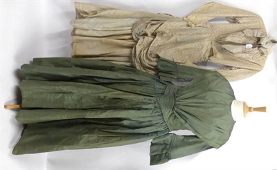 Lot 2136 - Circa 1860 Green Silk Dress, with elbow length flared sleeves, round neck, pleated v detail to...