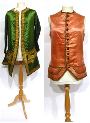 Lot 2139 - Gents 18th Century Green Silk Frock Coat with gold applique trim, front pockets and woven...