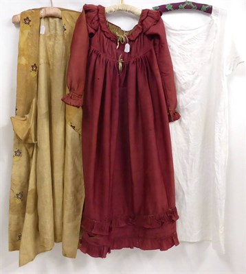 Lot 2140 - Circa 1810 Red Empire Style Long Sleeved Dress, with braid and gathered trim to the neckline...