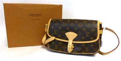 Lot 2169 - Louis Vuitton Shoulder Saddle Bag, in monogrammed canvas with light tan trim and shoulder...