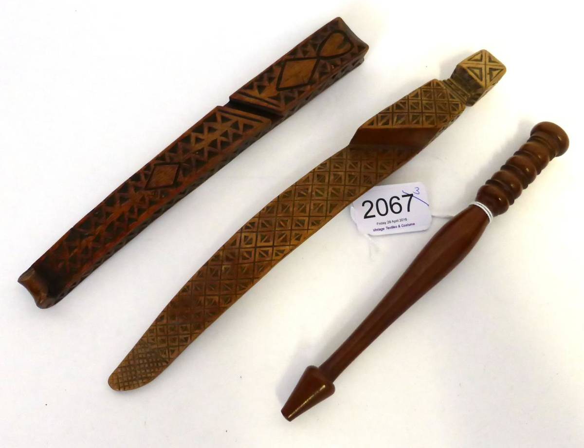 Lot 2067 - 19th Century Straight Treen Knitting Stick, with chip carved decoration to one side, 25cm by 2.5cm