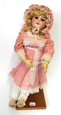 Lot 2001 - A French Jumeau Bisque Socket Head Child Doll, impressed '7' 'DEP', with blond wig, pierced...