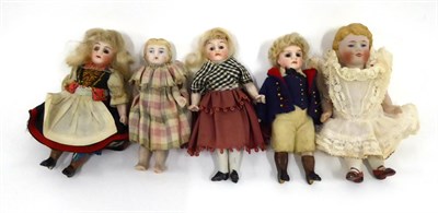 Lot 2004 - Two Similar Miniature Bisque Head Dolls, with fixed brown eyes, fully dressed, blond wigs,...