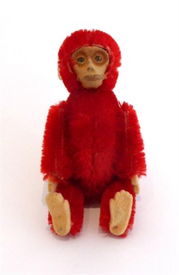 Lot 2005 - Miniature Schuco Red Monkey Powder Compact, with removable head, hinged body enclosing pale...