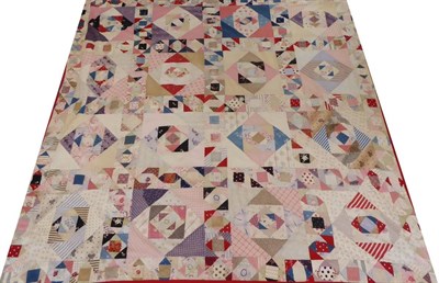 Lot 2022 - 19th Century Patchwork Cover, comprising coloured printed cottons worked in triangular shapes, with