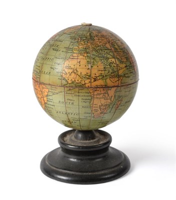 Lot 2070 - Clark & Co Anchor Machine Cotton Small Terrestrial Globe Shaped Thread Holder, on a shaped ebonised