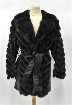 Lot 2106 - Black Leather Long Jacket with Brown Mink Chevron Stripes, leather belt