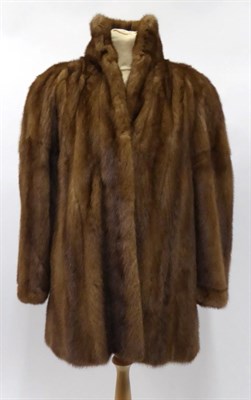 Lot 2108 - A Light Brown Mink Jacket, with dark tan leather inserts and stand up collar