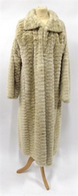 Lot 2170 - A Long Grey Mink Coat, with tiered horizontal pelts, collar and cuffed sleeves