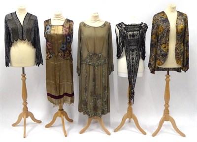 Lot 2184 - Circa 1920s Evening Wear, comprising a bronze and floral lame evening jacket; a gold drop waist...