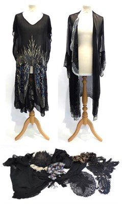 Lot 2187 - A Circa 1920s Black Silk Chiffon Shift Dress, with silver sequin decoration and shaped hem;...