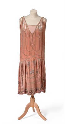 Lot 2189 - A Circa 1920s Pale Pink Velvet Sleeveless Shift Dress, with chiffon modesty panel, bead and...