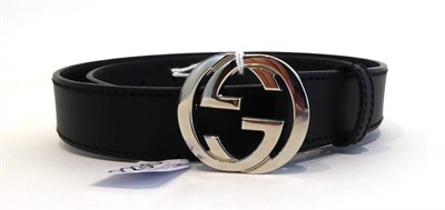 Lot 2236 - Gucci Black Leather Belt, with chrome intertwined G's buckle, in a Gucci card box (a.f.)