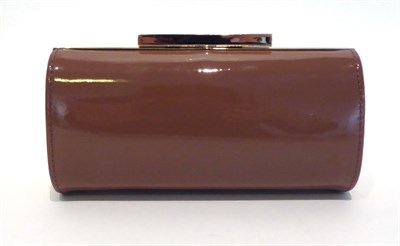 Lot 2257 - L K Bennett Patent Avon Clutch Bag, in a dark patent peach with gilt metal mounts, and chain...