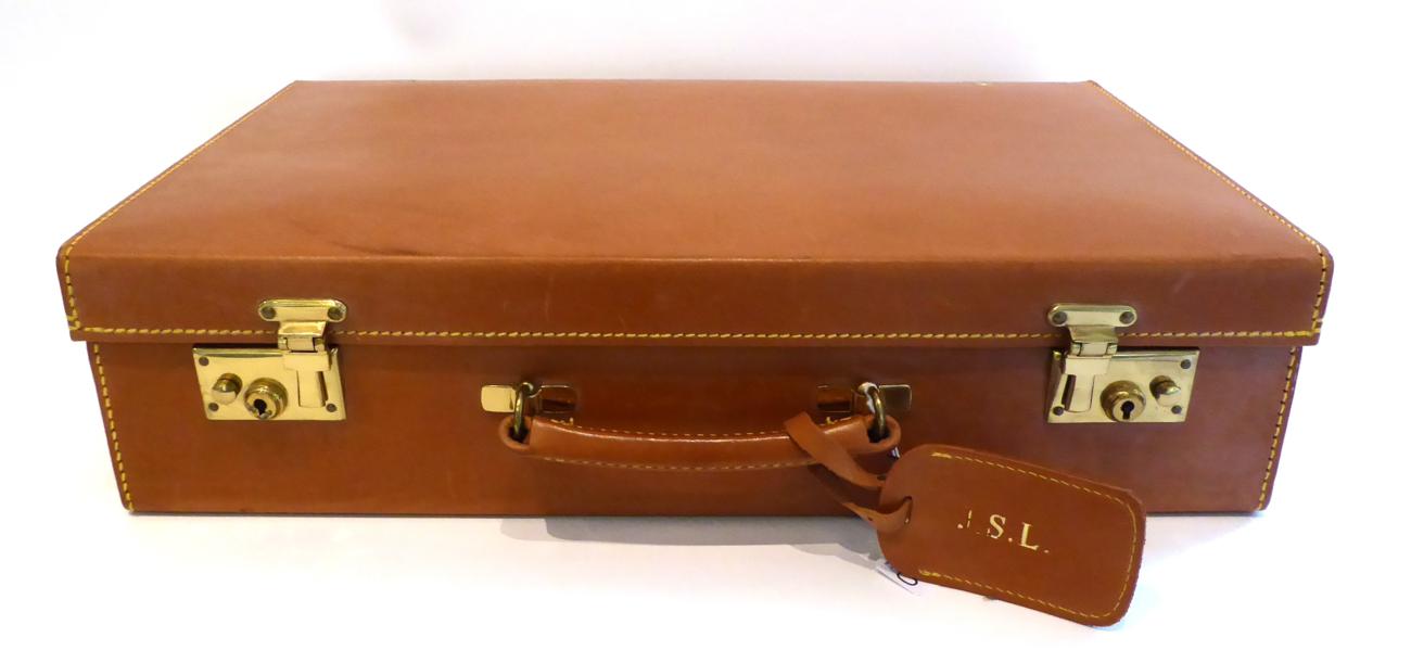 Lot 2270 - A Papworth Tan Leather Case, with cream canvas interior, together with two keys, luggage label,...