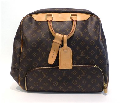 Lot 2284 - Louis Vuitton Travel Bag, in monogrammed leather with tan leather handles and trim,, zipped...