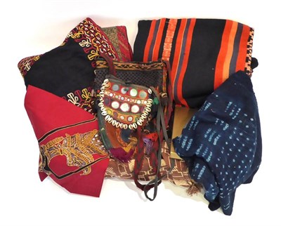 Lot 2293 - Assorted Ethnic Costume and Textiles, including a woven poncho in navy blue with red stripes,...