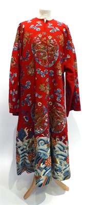 Lot 2298 - A Late 19th Century Chinese Red Wool Robe, embroidered with silk and metallic threads, with...