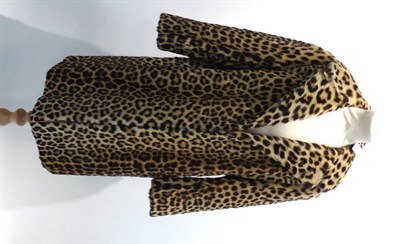 Lot 2111A - Leopard Skin Fur Coat, circa 1960, 42in (107cm) bust, 35in (89cm) long With CITES A10...