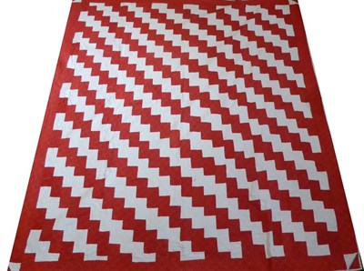 Lot 2017 - Large 19th Century Red and White Geometric Patterned Quilt, with cream reverse. 200cm by 223cm