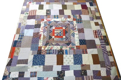 Lot 2020 - Early 19th Century Large Double Sided Patchwork Quilt, incorporating a variety of printed...