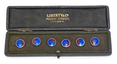 Lot 2078 - A Set of Six Enamel Buttons, cased by Liberty & Co, each planished and enamelled in tones of...