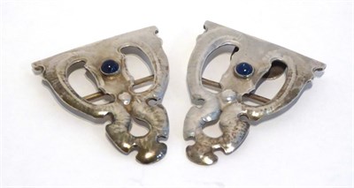 Lot 2079 - An Art Nouveau Sapphire Set Silver Buckle, by William Hutton & Sons Ltd, each half with a round...