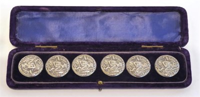 Lot 2081 - Six Silver Art Nouveau Style Buttons, embossed with maidens, in a fitted blue velvet case