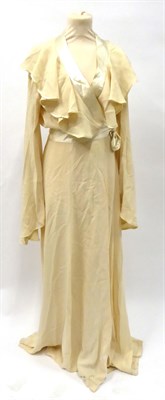 Lot 2097 - Ossie Clark Cream Moss Crepe Wrap Wedding Dress, with frilled neckline, satin waist ties and trims