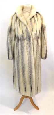 Lot 2110 - A Canadian White Mink Coat with silver tips, three quarter length of swing style, with small collar