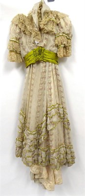 Lot 2112 - An Edwardian Cream Silk Two Piece Evening Dress, printed with roses, comprising a short sleeved...