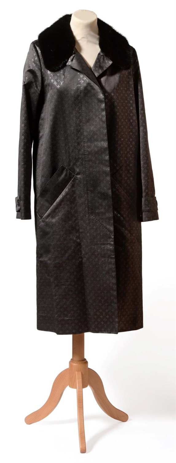 Lot 2127 - Louis Vuitton Grey and Metallic Thread Monogram Mac/Trench Coat, with detachable black fur...